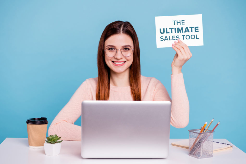 woman, postcard, laptop